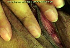 latina woman uses toys alone while partner works