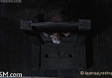 In the depths of hardcore thraldom, a submissive endures intense domination and bondage play.