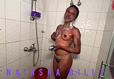 Natasha relaxes in a soothing bath, enjoying the warm water and peaceful moment