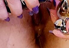 Amateur Solo Inserts Buttplug Into Shaved Wet Pussy In Shower