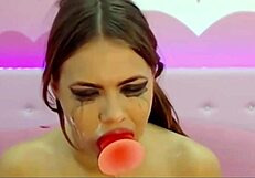 teen cam model playing sloppy with her dildo on webcam