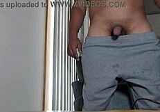 Chalatan masturbates in the living room with sexy cock.