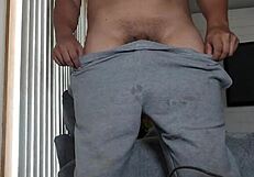 Chalatan masturbates in the living room with sexy cock.