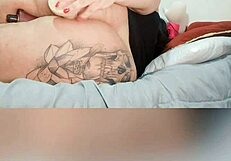 Fat Latina BBW with tattoos uses toys, showing natural tits