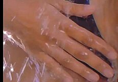 washing the car with a hose in the shower