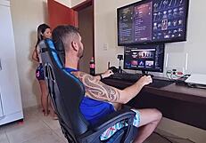 This blonde pregnant amateur keeps interrupting my game with her cock teasing.