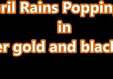 April Rains' Popping Ass Tease in Gold Black Fit