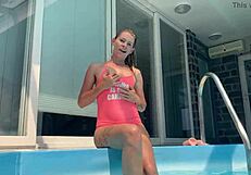Blonde fucks ass with dildo by pool!