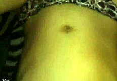 A skinny girl is hanging out at my friend's house, enjoying a relaxed afternoon.