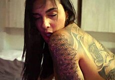 the cute teen girl lay on her bed and began touching her pussy intimately. she explored her body with oral pleasure.