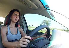 she's naked in front of the gremio arena, showing off her big tits for voyeur eyes