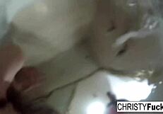 Behind the scenes in the makeup room bath with sexy Christy Mack, showcasing her big tits and tattoos