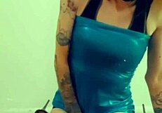 Feminized transsexual pornstar kneels in stockings and lingerie, eagerly sucking cock during interview.