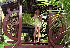 Blonde teen undressing in a short sun dress. Enjoying the bower's calm vibe.