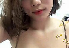 em ngoc nguyen shows off her big tits