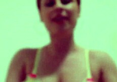 Emme White teases with red nails and pink pussy in foot fetish fun