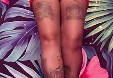 teasing in ripped pantyhose and latex dress