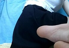 pretty skinny girl playing with her anal tail dildo and feet