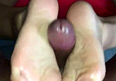 Wife enjoys homemade doggystyle and footjob ending in creampie