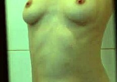 I love watching my skinny blonde girl bathing in the shower, her body so enticing under the water.