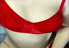 White girl in red lingerie moans softly