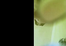 Beautiful redhead masturbates in the shower, fingering her wet pussy.