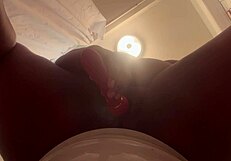 Ebony Woman Playing With Toys In The Bathroom