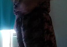 She strips naked, showing her teen brunette ass