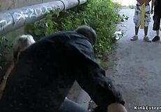 Hey, wanna see this blonde bound in latex outdoors for hardcore domination?