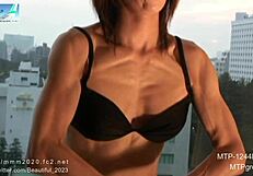 Muscle girl showing off natural strength in unique fetish video