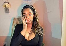 Tattooed milf plays with her pussy!