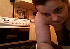 Mature woman displays her ass on high definition webcam during private session.