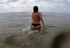 This hot couple couldn't resist banging on a public beach.