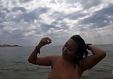 This hot couple couldn't resist banging on a public beach.