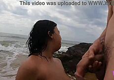 This hot couple couldn't resist banging on a public beach.