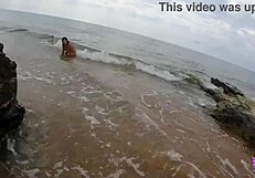 This hot couple couldn't resist banging on a public beach.