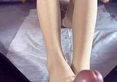 My friend's sister cums on pantyhose feet during footjob