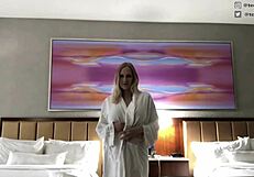 Blonde with big tits performs striptease in hotel room