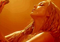 Watch this blonde tease with big tits and ass to music