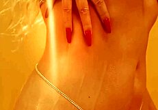 Watch this blonde tease with big tits and ass to music