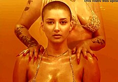 Watch this blonde tease with big tits and ass to music