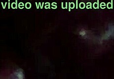 a woman tenderly makes her partner feel good in an intimate moment