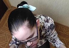 Secretary Anna kneels and gives her boss a passionate blowjob in the office.