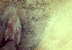 She plays with her wet pussy, reaching orgasm with a close-up view