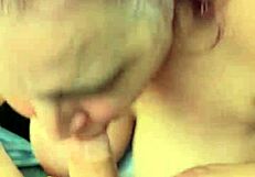 Tina, my step mom, sucks my tiny cock passionately.