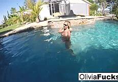 Olivia enjoys summer pool relaxation