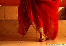 WATCH THIS BRUNETTE MILF RIP HER CLOTHES OFF IN A SEDUCTIVE STRIPTEASE DANCE!