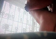 Watch this busty housewife cheat on her husband with a stranger's cock in the window?