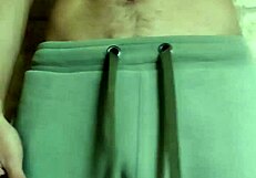 Gay man playing with his navel