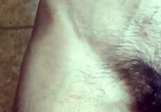 Gay man playing with his navel